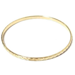 Women's fancy bracelet in golden metal decorated with ornaments