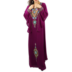 Beautiful plum-coloured oriental evening dress adorned with numerous embroidery with...