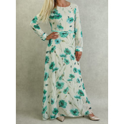Long flowing white chiffon dress with blue-green floral patterns with matching belt for...