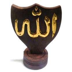 Garniture en bois comportant le nom "Allah" gravé en metal doré
