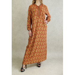 Flowery house / summer dress for women on apricot color background