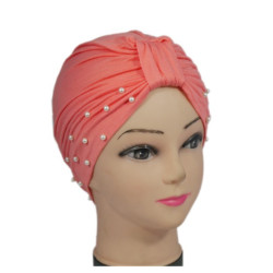 Bonnet égyptien perlé de couleur rose