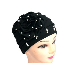 Beaded hat with a large flower on the side in solid black color