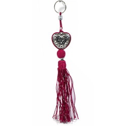 Porte-clés artisanal coeur en métal argenté ciselé et pompon en sabra - Fushia