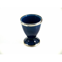 Coquetier artisanal marocain en poterie de couleur bleu pétrole émaillé et cerclé de...